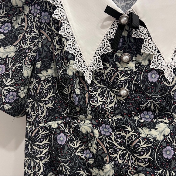 A dress with a flower pattern. - Picture 2 of 2